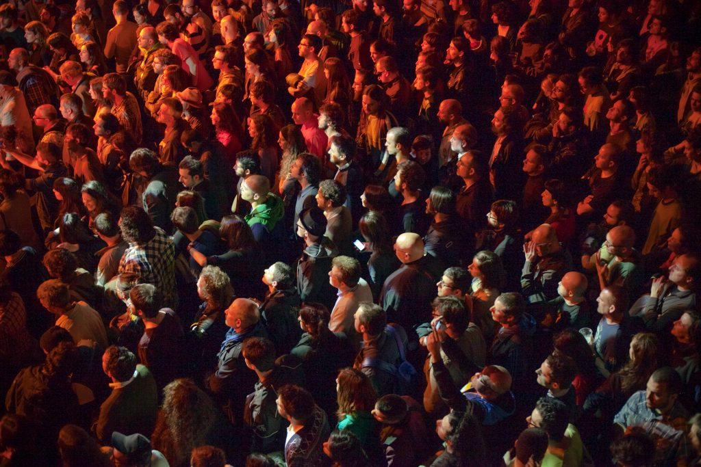Live event photography showing an audience during a performance.